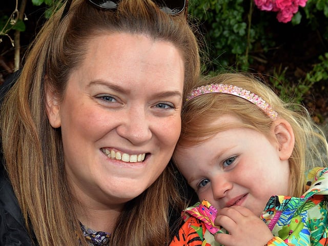 Claire-Marie Nelson and daughter Hannah (2) pictured at The Last Saturday parade in Loughgall. TH 03.