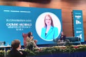 Finance Minister Dr Caoimhe Archibald speaks to host Caroline O'Neill at the CelebrateHER conference in Coleraine. Credit UC