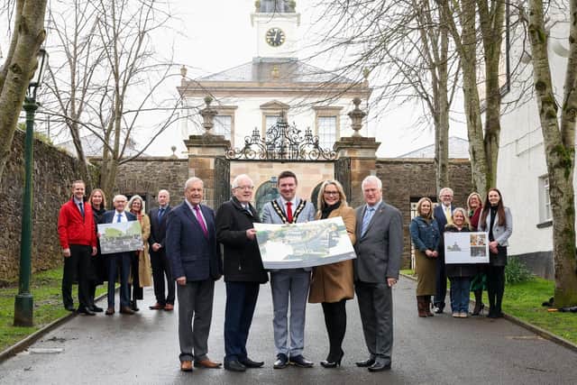 Recognising the successful multi-million Belfast Region City Deal funding bid for 'Destination Royal Hillsborough' are:(Front l-r): Councillor Uel Mackin, BRCD Council Panel member; Alderman Allan Ewart MBE, Development Committee Chairman; Mayor of Lisburn & Castlereagh City Council, Councillor Scott Carson; Laura McCorry, Head of Hillsborough Castle & Gardens and Alderman Michael Henderson MBE, BRCD Council Panel member.(back left): Councillor Caleb McCready; Carole Long, Tourism Northern Ireland; Alderman Jim Dillon MBE; Penny Scott, Honorary Treasurer of St Malachy's Parish Church and Donal Rogan, Director of Service Transformation.(back right) Claire Butler, In Klover; Alderman Owen Gawith; Dawn Mitchell, Hillsborough Development Committee Chair; Yvonne Burke, Regeneration & Infrastructure Manager and Emron Irwin, Chairperson of the Hillsborough Village Centre Committee.  Pic credit: Darren Kidd