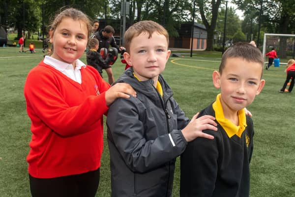 Children from Key Stage 2 at Hart Memorial Primary School and Presentation Primary School taking part in a Shared Education sports day in Portadown People's Park. PT23-207.