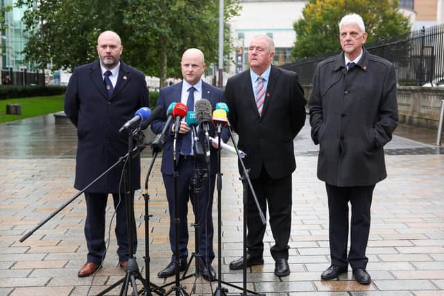 Portadown Orange District Master Nigel Dawson, Alan Hynes, who took the original case and Deputy District Master Alistair Power leave the court with legal rep Jamie Bryson. Picture by Jonathan Porter/PressEye