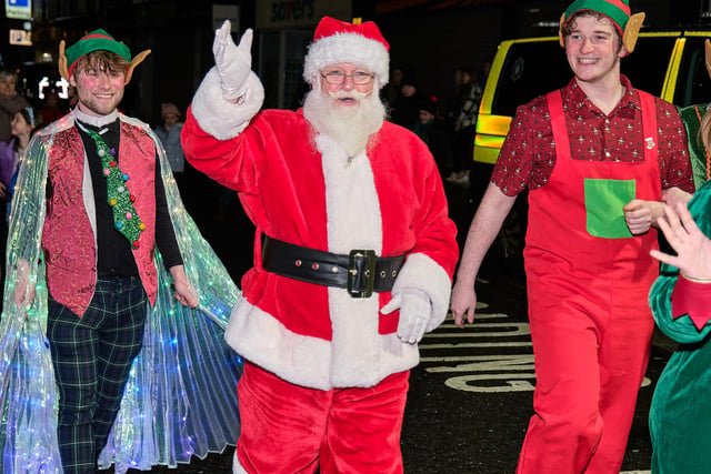 Santa with his helpers arriving in Magherafelt town centre on Saturday night.