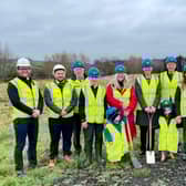Education Permanent Secretary Dr Mark Browne; Arlene Cambridge, principal; William Kane, chair of board of governors; Barry Mulholland, chairman of the Education Authority  and officials, representatives from McAdam Design and Martin & Hamilton Ltd and pupils cutting the first sod to officially mark the beginning of construction work at Islandmagee Primary School.