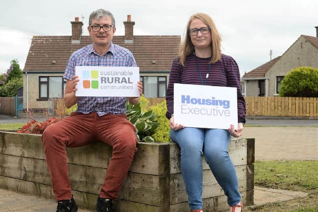 Eoin McKinney (left), Rural Officer and Joanne White, Ballymoney Patch Manager from the Housing Executive, pictured in Lislagan, where the organisation is conducting research into local demand for social and affordable homes. Credit NIHE
