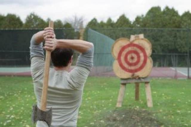 Take aim at a stress-relieving axe throwing experience. Picture: The Activity People / Facebook