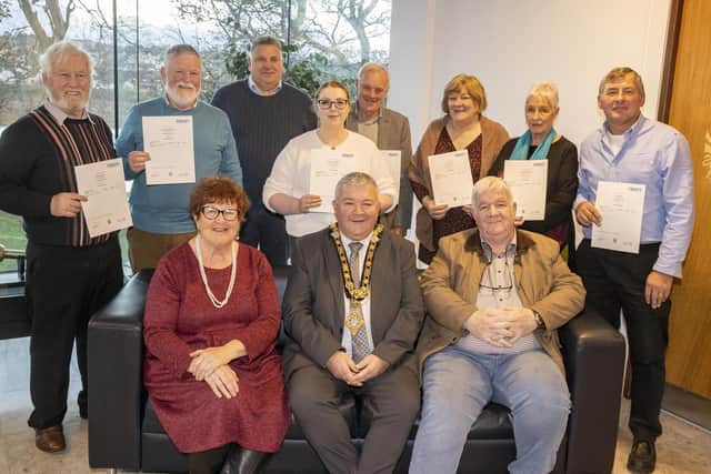 Pictured at the reception in Cloonavin are, back row, left to right, George McAuley, JJ Mc Taggart, Graham Thompson (Chief Executive of Causeway Coast and Glens Heritage Trust), Rachel McBride, Derek Sinnamon, Frances Mc Neill, Joanne Honeyford, David Carr, and front row, left to right: Liz Weir MBE, the Mayor of Causeway Coast and Glens Borough Council Councillor Ivor Wallace, and Stephen O’Hara