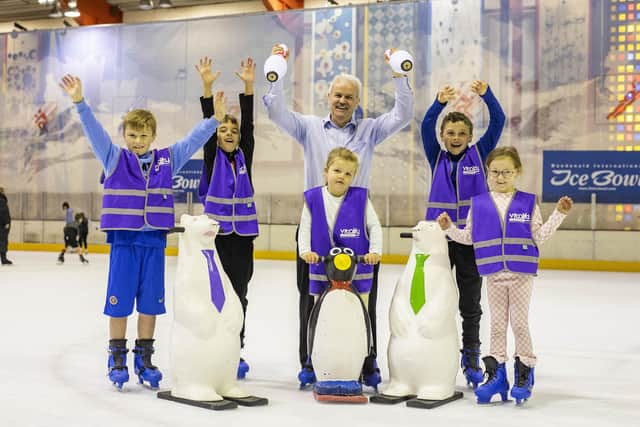 Councillor Thomas Beckett, Chair of Lisburn & Castlereagh City Council’s Communities & Wellbeing Committee pictured with children attending the first ever Summer Scheme at Dundonald International Ice Bowl. Pic credit: Lisburn and Castlereagh City Council
