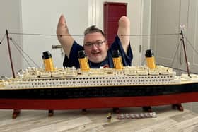 Portstewart's DJ Calvert with his completed Lego Titanic. Credit News Letter
