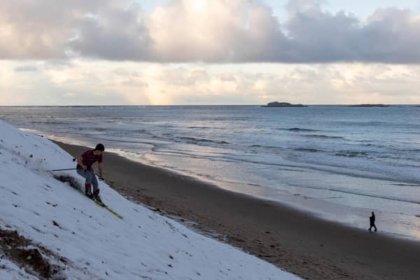 Cameron Leighton from Causeway Coastering in Portrush takes advantage of the ski while also enjoying the surf on the same day