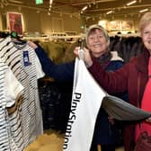 Sisters Yvonne Bryce, left, and Jean Harris searching for Christmas gifts at the new Primark store. PT50-224.