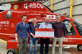 Ciaran Shevlin, Rory O'Connor, Mickey O'Connor and Ryan Donnelly donate the money raised to the Lisburn based charity. Pic credit: Air Ambulance NI
