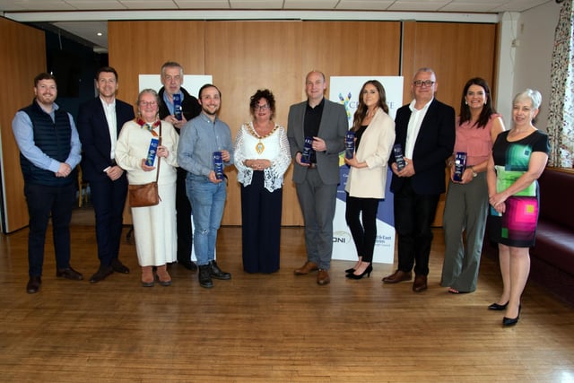Mayor of Mid and East Antrim Council, Alderman Gerardine Mulvenna, centre, pictured with prizewinners, sponsors and representatives of award hosts National World at the Carrick Business Awards at Carrick Golf Club. CT17-207