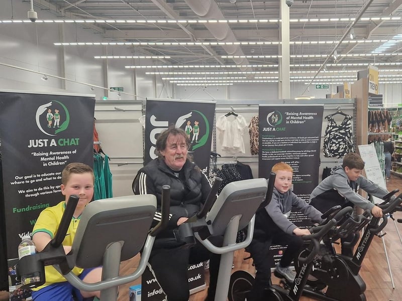 All ages took part in a charity cycle event in Asda, Portadown to raise vital funds for local charity Just A Chat, which was set up to raise awareness and combat the stigma of mental health for youths.