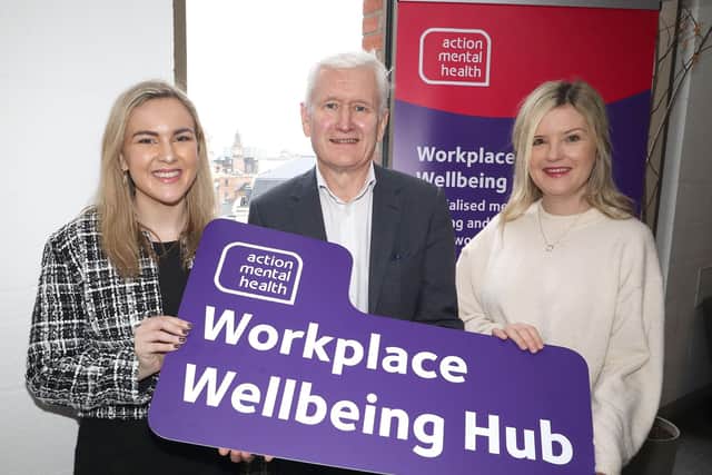 Workplace Wellbeing Coordinator, Lauren Houston with Action Mental Health CEO David Babington and Dr Ruth Fleck.