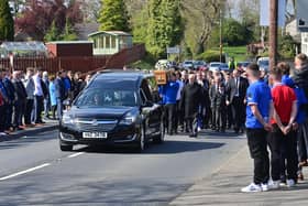 Pacemaker Press 23/03/23 Family and Friends attend the funeral of Ben Gillis at Ballymore Parish Church in Tandragee on Sunday. Ben A talented footballer who played for Portadown club Hanover was involved in a single-vehicle traffic collision on the Marlacoo Road, Richhill on 16th of April. He remained critically ill in hospital until he sadly passed away on Wednesday evening. Pic Pacemaker