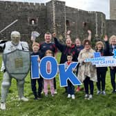 Launching this year’s Storming the Castle 10k road race  are the Mayor of  Mid and East Antrim, Alderman Gerardine Mulvenna, and Andy Smyth, race director, with Seapark AC club members, Seapark ‘Knight Sir’ Neil Harper and Austin Kelly, sponsor Clanmil Housing. Photo:submitted