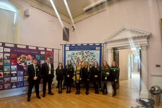 Local students paid a visit to Lisburn Museum to view the memorial quilt. Pic credit: SEFF