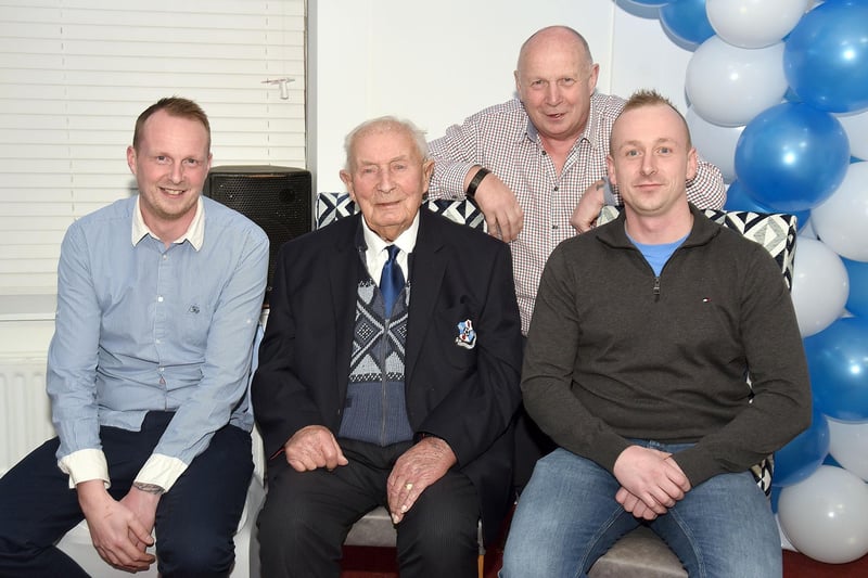 Hilbert Willis pictured at his 100th birthday party with close family members from left, Gareth Willis (grandson), Leslie Willis (son) and Adam Willis (grandson). PT07-204.