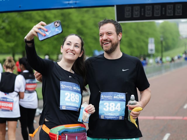 Pausing for a selfie at the Phoenix Energy Belfast City Marathon.