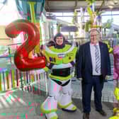 Councillor Jonathan Craig, Chair of Communities and Wellbeing, Lisburn & Castlereagh City Council gets ready to celebrate 25 years of Lagan Valley LeisurePlex with 1999 favourites, Buzz Lightyear and Barbie. Pic credit: LCCC