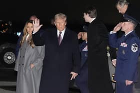 President-elect Donald Trump and Melania Trump arriving at Dulles International Airport on Saturday. Trump's inauguration takes place in Washington on Monday