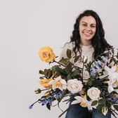 Designer and textile artist Angeline Murphy from Magheralin has created a stunning fabric floral display infused with scents from Jo Malone which is on display at the FIFA World Cup in Qatar