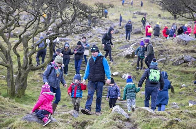 Get your walking shoes at the ready and join the hundreds of visitors at Slemish Mountain this St Patrick’s Day for the annual trek up the hill - where legend has it St Patrick worked as a shepherd.  The traditional St Patrick’s Day climb of Slemish will take place on Sunday, March 17 - with a series of activities planned to make it a rewarding experience for all.  The music marquee at Slemish Car Park will offer lunchtime entertainment from Portglenone Comhaltas Group and Counties Antrim and Derry Country Fiddlers Association - performing traditional music and dance. The one and a half kilometre walk at Slemish takes approximately one hour up and down and it is strongly advised that suitable clothing and strong footwear is worn. Sections of the short climb can be steep and slippery and might not be suitable for all. There will be no parking anywhere near Slemish and traffic patrols will enforce all no waiting cones, so a free park and ride service will operate from Silverwood/Michelin at Broughshane, just off the M2. Follow the yellow and black event signs on all approaches. Parking for blue badge vehicles is also available at Silverwood/Michelin.The shuttle bus to Slemish Mountain will run continually from 9am with the last departure from Michelin/Silverwood at 3:30pm.  Please note, dogs are not permitted for this event.For further information and download a guide for the day visit www.midandeastantrim.gov.uk/stpatricksday