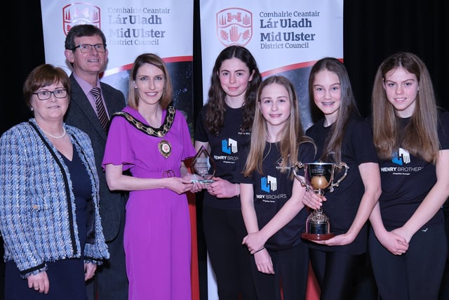 The Rainey Under 11 Ulster Cup winners receive their award from Chair of the Council, Councillor Córa Corry with nominating councillors Martin Kearney and Christine McFlynn.