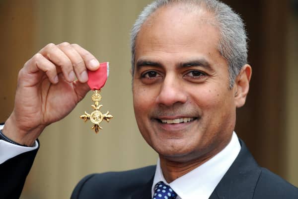 George Alagiah at Buckingham Palace after collecting his OBE from the Queen.