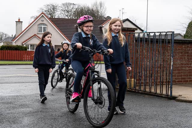 Pupils from Tobermore Primary School arriving at school by foot and bicycle for the start of the Sustrans Big Walk and Wheel 2023.