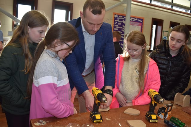 Trying out some woodwork at the Open Day at St Conor's College Kilrea site