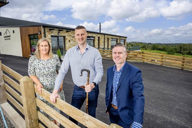 Katie and Jamese McCloy from Glenshane Country Farm and Ciaran Doherty, Head of Regions and Investment at Tourism NI,  officially launch Country Barn at Glenshane Country Farm.