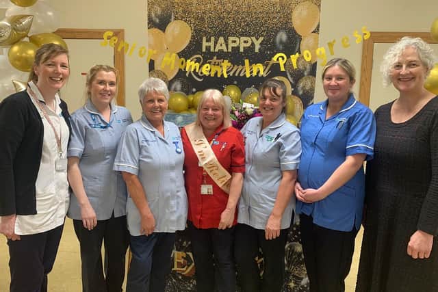 Sandra Best with staff from Thompson House Hospital. Pic credit: SEHSCT
