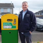 Coolnafranky Park Residents Chair with Housing Executives's Shane Conlon at the New Defibrillator.