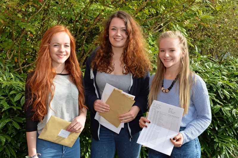 Pictured in 2014 are Larne Grammar School students, Kiera McKay, who received 6A stars and 4As in her GCSE exams; Katie Clements, who received 3A stars, 4As and 4Bs, and Naomi Murray, who got 5A stars and 5As. INLT 36-003-PSB