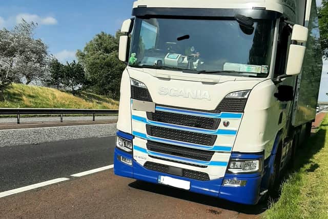 Police stopped the driver of this lorry on the M1 after he was spotted driving with one foot on the dashboard. Picture: PSNI