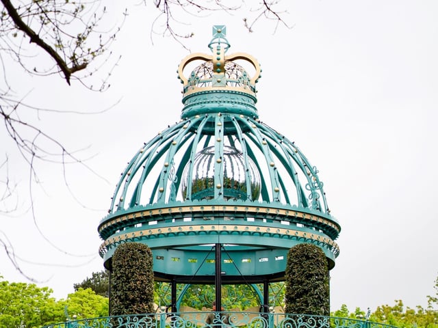The ornate three floor pavilion is topped by a crown.