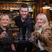 DRIVING HOME FOR CHRISTMAS: With the Christmas party season fast approaching, Craigavon-based drinks distributor United Wines has launched details of its festive Designated Driver campaign to help Northern Ireland revellers enjoy the party season and get home safe. Starting from November 18, the initiative will see partygoers who volunteer themselves as a designated driver rewarded with a free Heineken®0.0 or Birra Moretti Zero when they make themselves known to bar staff by showing their car keys at participating venues. Launching the safe driving campaign are Gemma Herdman (left) and Maura Bradshaw of United Wines, with Willy Erwin of The Lansdowne on Antrim Road, Belfast.