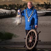 Council Chair, Councillor Dominic Molloy lights up the way to Lumarina at Ballyronan Marina, taking place Saturday, August 19. Credit: Mid Ulster Council