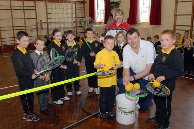 Brian and Tina Cushnie of Tennis Fundamentals give an introduction to tennis to pupils at King's Park Primary School in 2010 to launch tennis coaching sessions in Lurgan Park.