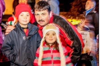 Harry and Asha with their dad Ian Creighton enjoying the fun at the Ballyclare lights switch on event in 2014.
