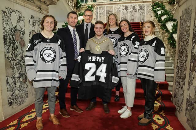 Providence College Women’s Ice Hockey Team present Lord Mayor of Belfast, Councillor Ryan Murphy with a personalised team jersey. Picture: William Cherry, Press Eye