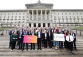 Finance Minister pictured with  representatives of  Causeway Coast and Glens and Mid South West Growth Deals. CREDIT KELVIN BOYES