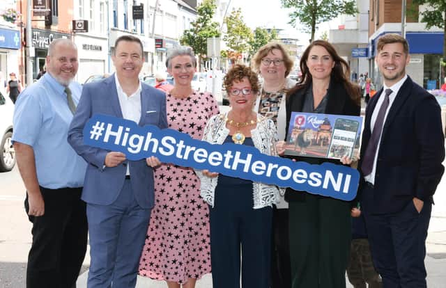 Nominations for this year’s High Street Hero Awards, powered by Retail NI, are now open until Saturday, July 31, and locals from across the Mid and East Antrim Borough Council area are being encouraged to vote for their favourite online to help them win a coveted award. Pictured are Retail NI chief executive Glyn Roberts with Cllr Paul Reid; Julie Ozturk, Camelot; Mayor Gerardine Mulvenna; Cllr Maureen Morrow; Edel Scanlon, and Andrew Bartlett from Roam. Photo: Darren Kidd- PressEye