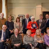 Mayor Ald Noel Williams, Cllr Wilson and Cllr Hadden alongside Samaritans NI volunteers.