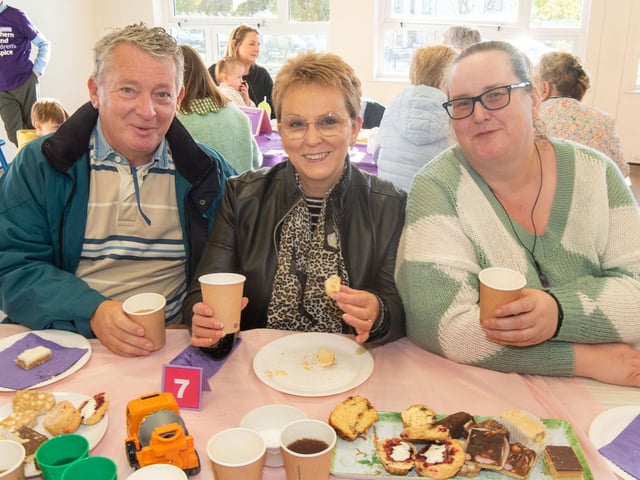 Looking happy at the Richmount Primary School charity coffee morning are from left, Stephen Armstrong, Sharon Armstrong and Tina Moffett