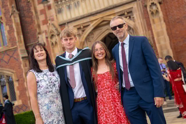 James Ballantine from Armagh celebrates with his parents and girlfriend Alice as he graduates from the School of Electronics, Electrical Engineering and Computer Science at Queen’s.