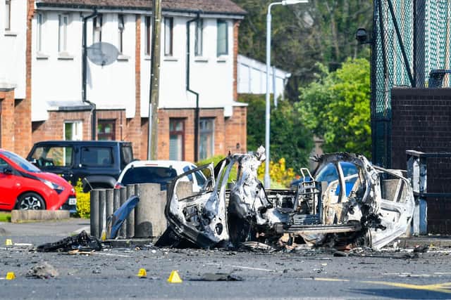 The scene on Sunday morning after a car explosion outside Dunmurry police station. Picture: Andrew McCarroll / Pacemaker.