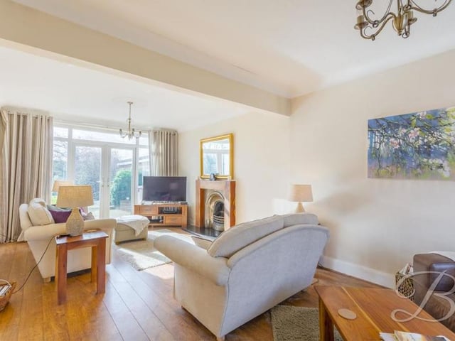 Through the porch and entrance hall, take a right turn and you will find yourself in this attractive lounge or living room. Bright and airy, it has a great sense of space, with French doors overlooking the back garden. It is also full of character, thanks largely to its feature fireplace.