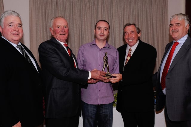 Winner of the Jameson Group Invitation Golf Tournament held at Portadown Golf Club in 2009 Eamon Corey, centre, receives his prize from special guests Harry Gregg, centre left and Gordon Banks, centre right, watched by David Jameson, left, and Stuart Jameson, right.